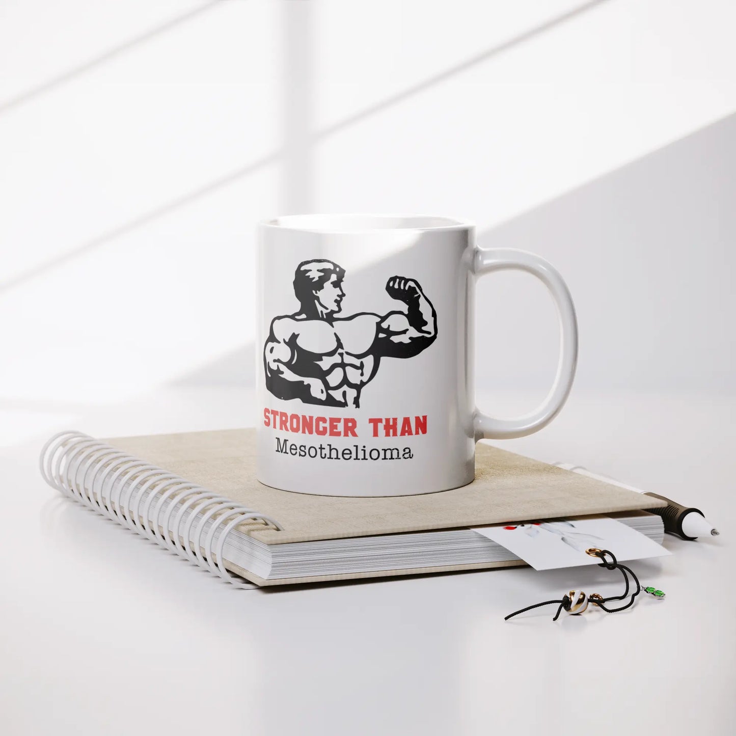 Limited_Edition_Stronger_Than_Mesotheli_Lifestyle_Notebook_Mockup.png