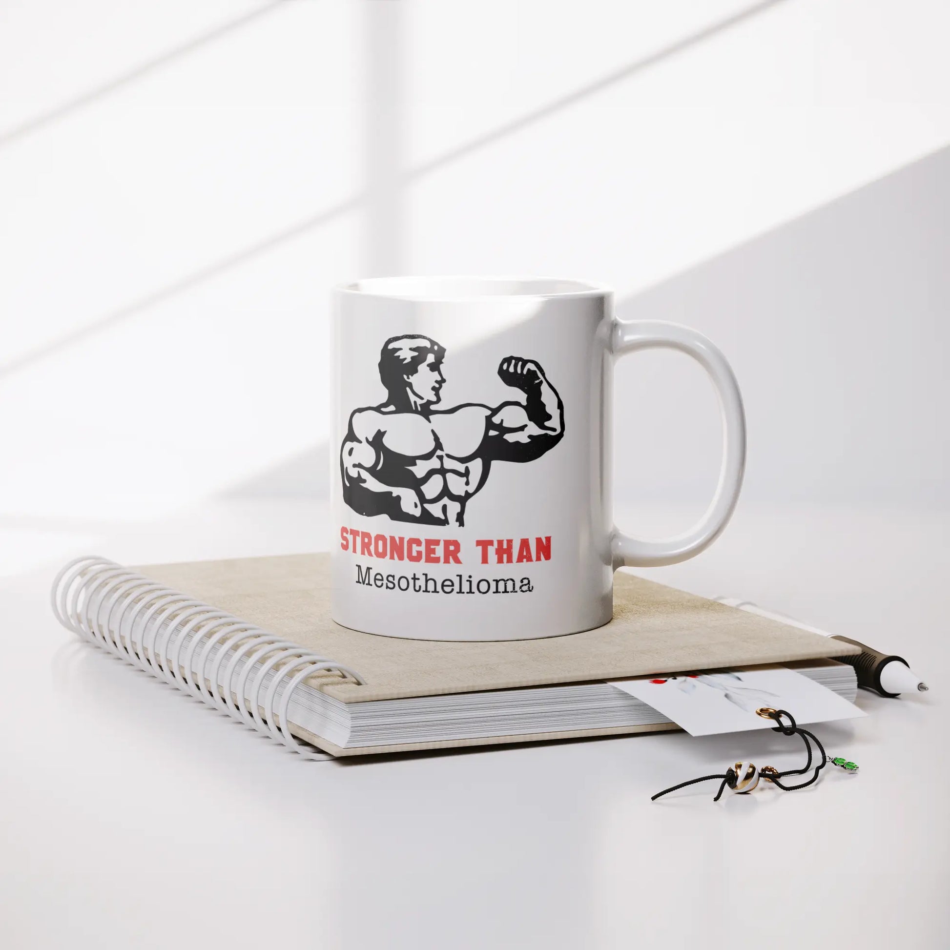 Limited_Edition_Stronger_Than_Mesotheli_Lifestyle_Notebook_Mockup.png